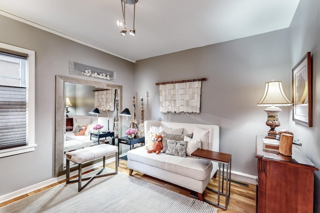 living area with hardwood / wood-style floors