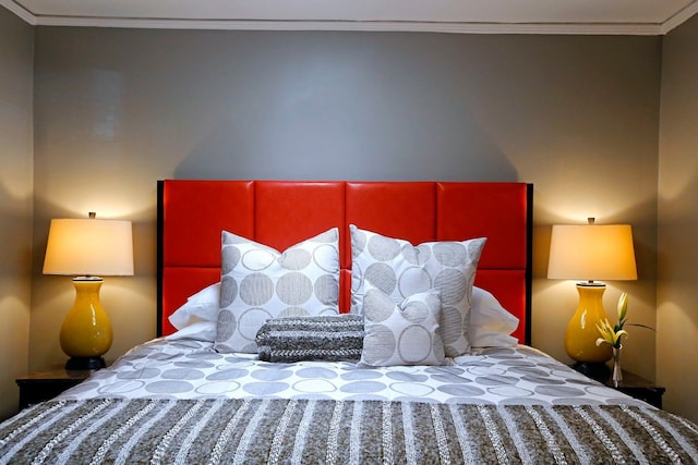 bedroom with ornamental molding