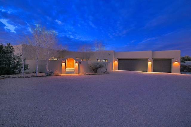 adobe home with a garage