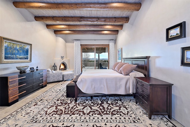 bedroom featuring beamed ceiling and wood ceiling