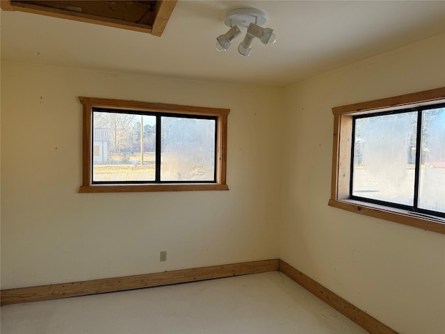 spare room featuring plenty of natural light