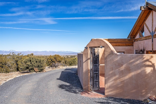 exterior space featuring a mountain view