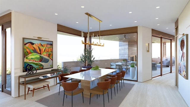 dining area featuring plenty of natural light and light hardwood / wood-style floors