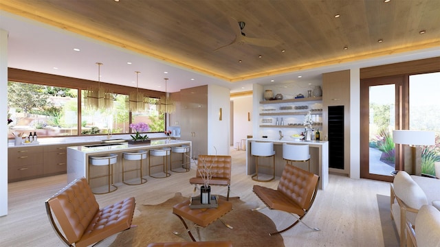 living room with plenty of natural light, light hardwood / wood-style floors, wood ceiling, and ceiling fan