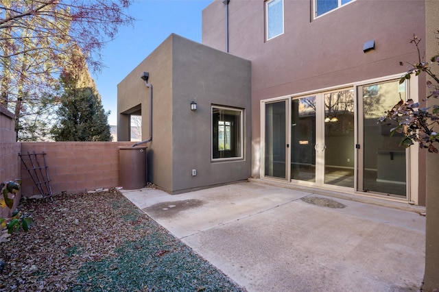 rear view of property featuring a patio