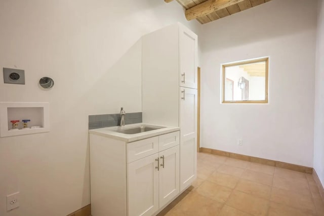 laundry room with wood ceiling, cabinets, electric dryer hookup, sink, and hookup for a washing machine