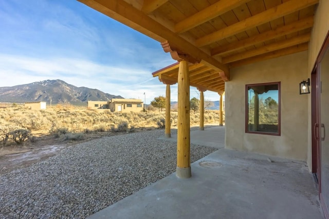 view of patio featuring a mountain view