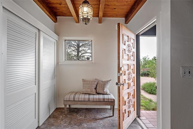 interior space with beamed ceiling and wood ceiling