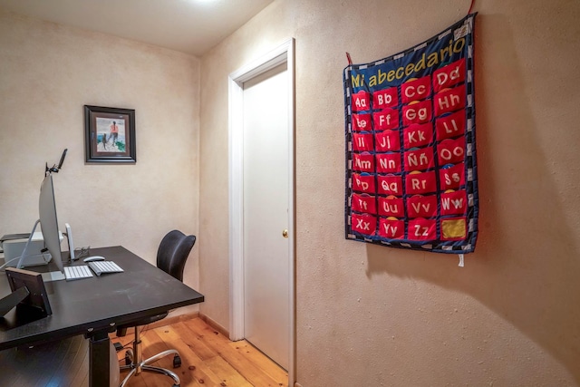 office space featuring light wood-type flooring