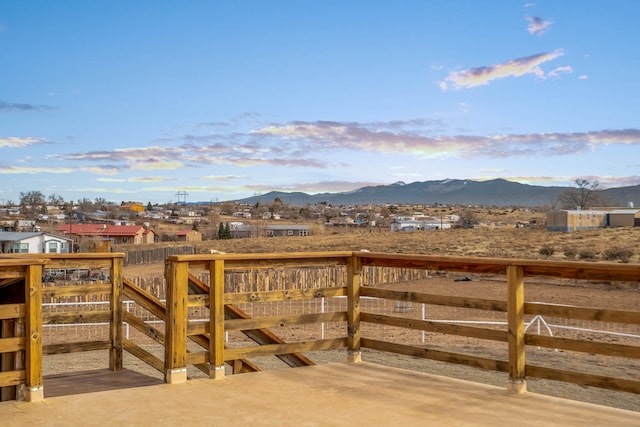 view of gate featuring a mountain view