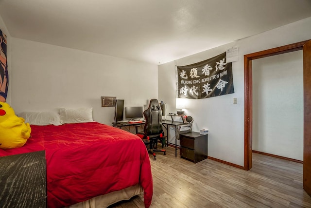 bedroom featuring light wood-type flooring