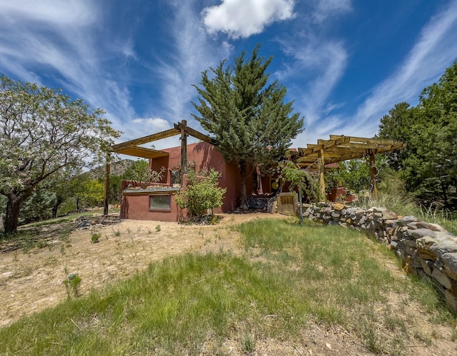 view of yard with a pergola