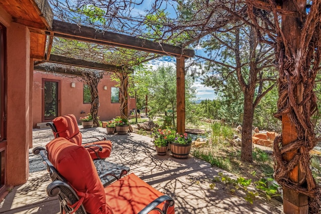 view of patio / terrace featuring a pergola