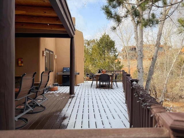 wooden terrace with area for grilling