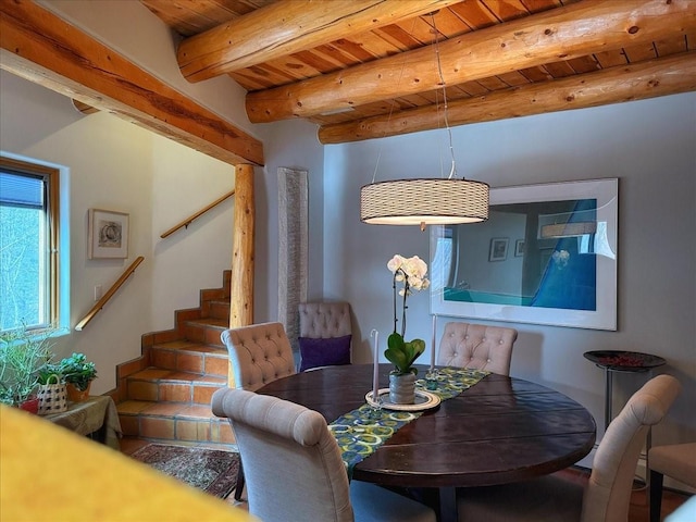 dining room with wooden ceiling and beamed ceiling