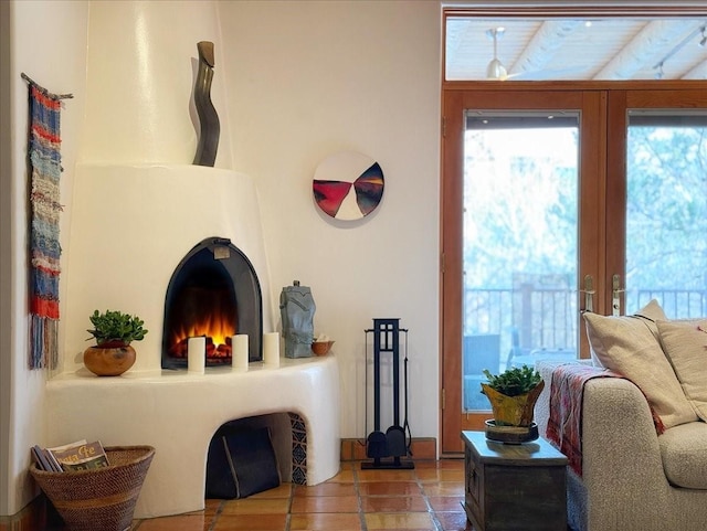 living room with tile patterned flooring