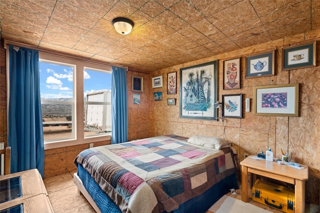 bedroom featuring light tile patterned floors