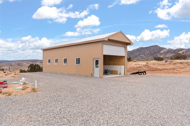 view of outdoor structure with a mountain view