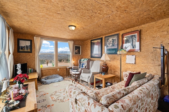 living room featuring wooden ceiling