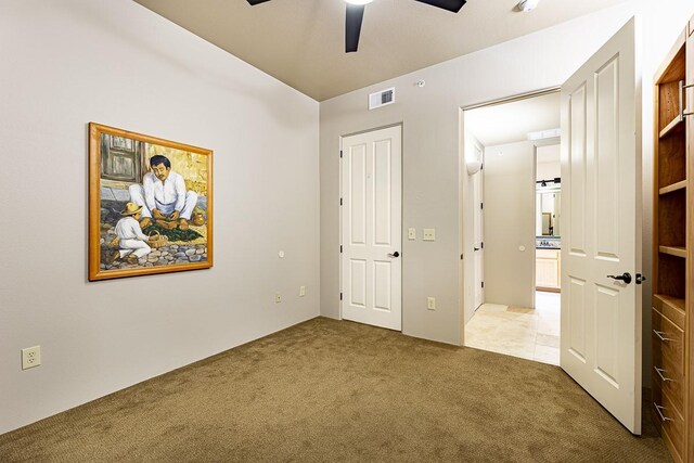 full bathroom with vanity, shower / bath combo with shower curtain, tile patterned flooring, and toilet