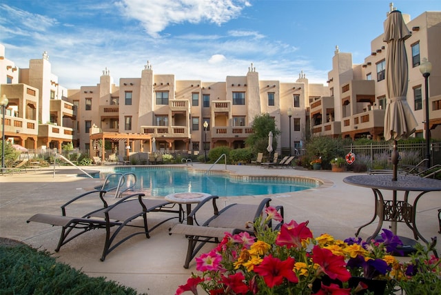 view of pool featuring a patio