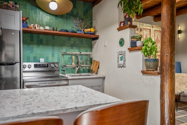 bar featuring beam ceiling, sink, and appliances with stainless steel finishes