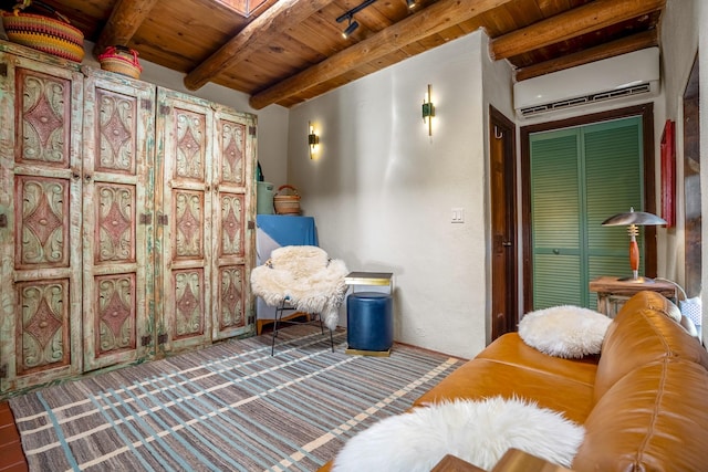 living area with a wall mounted AC, beamed ceiling, wood ceiling, and rail lighting