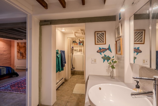 bathroom featuring a baseboard radiator, tile patterned floors, beamed ceiling, and sink