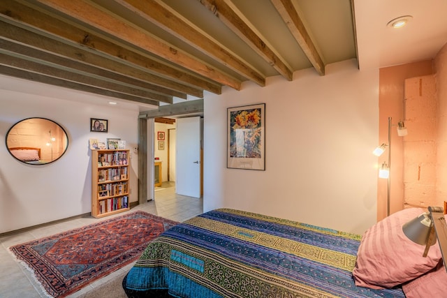 bedroom featuring beamed ceiling