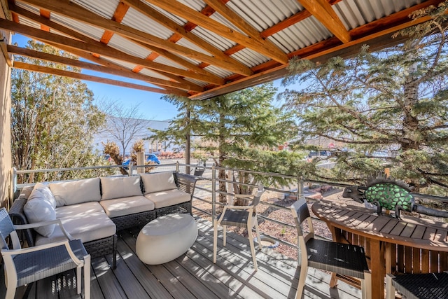 wooden deck featuring outdoor lounge area