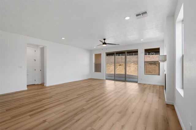 walk in closet featuring light colored carpet