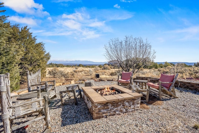 view of patio featuring a fire pit