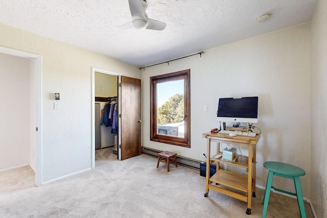 interior space with ceiling fan, carpet floors, and a textured ceiling