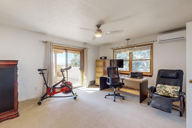 carpeted home office with a wall mounted AC, ceiling fan, and a textured ceiling