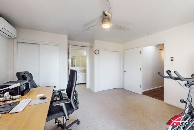 home office with a wall unit AC, ceiling fan, and carpet