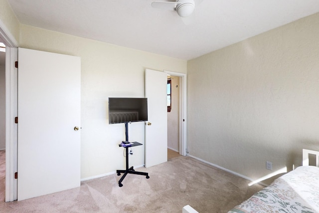 bedroom with light colored carpet