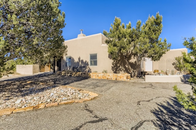 view of adobe home