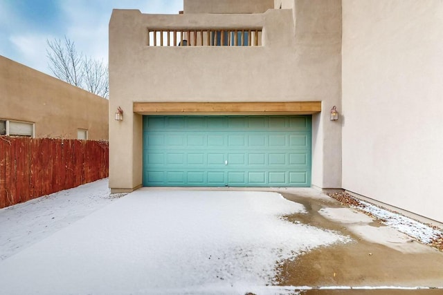 view of snow covered garage