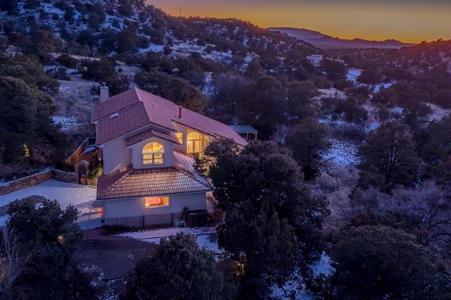 aerial view at dusk with a mountain view