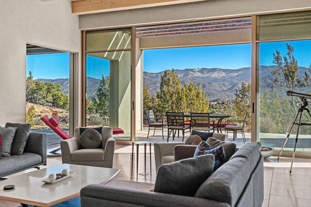 tiled living room with a mountain view