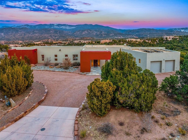 southwest-style home with a mountain view