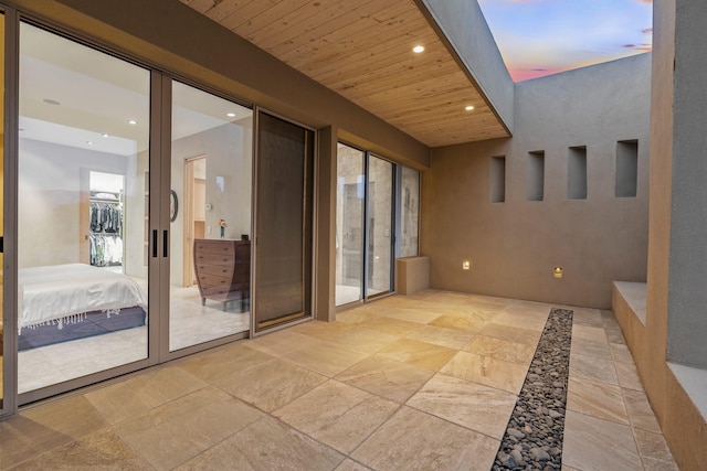 interior space with wooden ceiling