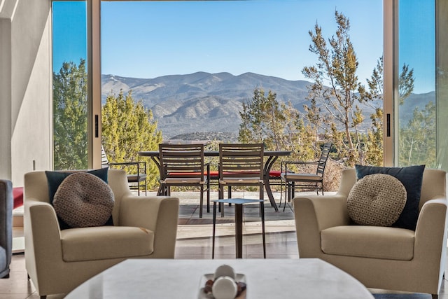 balcony with a mountain view and a patio area