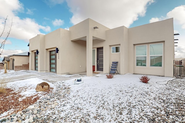 view of snow covered property