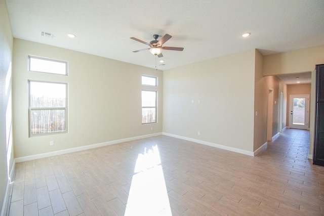 unfurnished room with ceiling fan