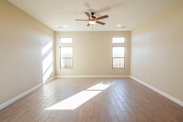 empty room featuring ceiling fan