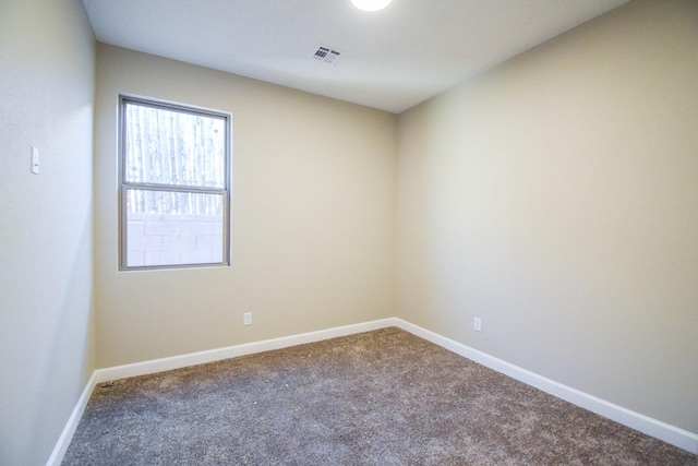 view of carpeted spare room