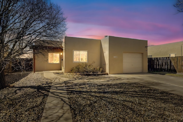 adobe home with a garage