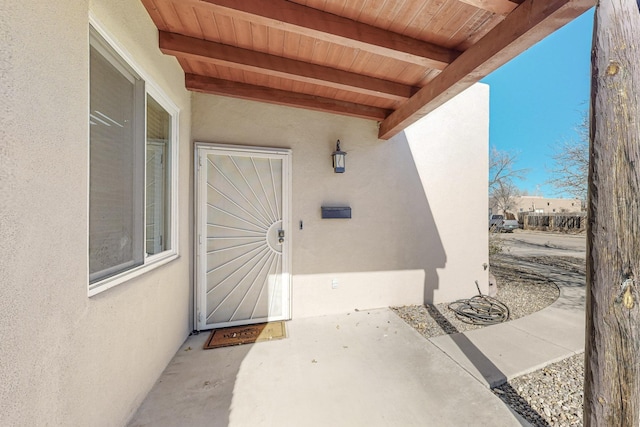 entrance to property with a patio area