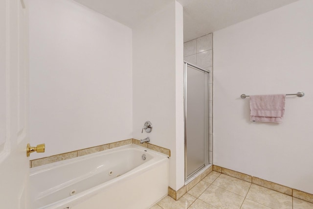 bathroom with tile patterned flooring and plus walk in shower